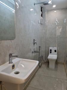 Common Bathroom Image of 810 Sq.ft 3 BHK Apartment / Flat for sale in Dwarka Mor New Delhi for Rs. 5500000