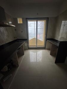 Kitchen Image of 550 Sq.ft 1 BHK Apartment / Flat for rent in Arihant Aarohi, Shilgaon Thane for Rs. 16000