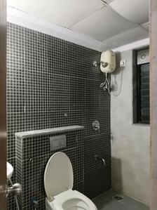Common Bathroom Image of 950 Sq.ft 2 BHK Apartment / Flat for sale in Lodha Palava Downtown, Palava Phase 2 Thane for Rs. 5800000