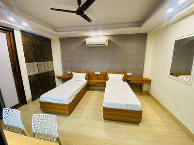 Bedroom Image of Urbanroomz Coliving PG Nearby Medanta in Sector 38, Gurgaon
