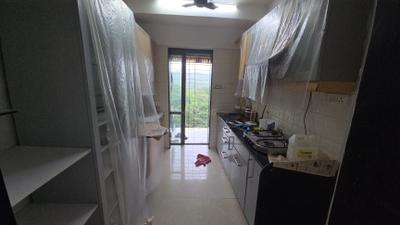 Kitchen Image of 860 Sq.ft 2 BHK Apartment / Flat for sale in Ekta Meadows, Borivali East Mumbai for Rs. 26000000