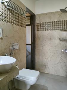 Common Bathroom Image of 600 Sq.ft 1 BHK Apartment / Flat for sale in Mulund East Mumbai for Rs. 10700000