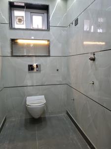 Common Bathroom Image of 1000 Sq.ft 3 BHK Apartment / Flat for sale in Dwarka Mor New Delhi for Rs. 9000000