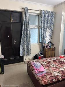 Bedroom Image of 950 Sq.ft 2 BHK Apartment / Flat for rent in Amrapali Zodiac, Sector 120 Noida for Rs. 25000