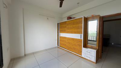 Bedroom Image of 1250 Sq.ft 2 BHK Apartment / Flat for rent in Shiv Shakti Uma Greens, Kudasan Gandhinagar for Rs. 23000