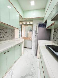 Kitchen Image of 1200 Sq.ft 3 BHK Apartment / Flat for sale in Sheth Vasant Lawns, Thane West Thane for Rs. 32000000