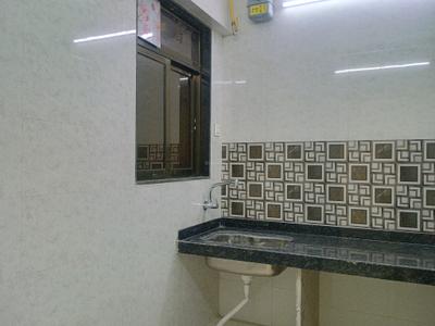 Kitchen Image of 905 Sq.ft 2 BHK Apartment / Flat for sale in Shivam Homes, Badlapur East Badlapur for Rs. 3200000