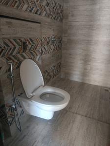 Common Bathroom Image of 1375 Sq.ft 3 BHK Apartment / Flat for sale in Krisna Nirmaan Amorapolis Phase 3, Lohegaon Pune for Rs. 9700000