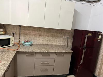 Kitchen Image of 500 Sq.ft 1 BHK Builder Floor for rent in Old Double Storey, Lajpat Nagar New Delhi for Rs. 25000