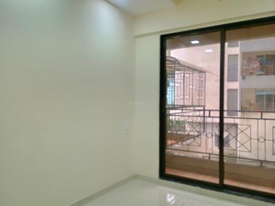 Living Room Image of 900 Sq.ft 2 BHK Apartment / Flat for sale in Tharwani Vedant Nakshatra Wing K Phase V, Badlapur West Badlapur for Rs. 4000000