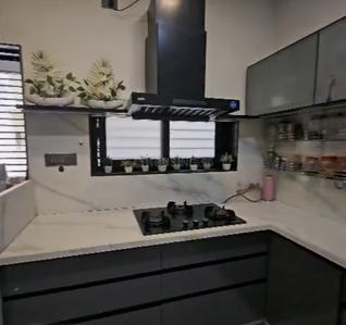 Kitchen Image of 1960 Sq.ft 4 BHK Villa for sale in Siddhi Aarohi Residency, South Bopal Ahmedabad for Rs. 24500000