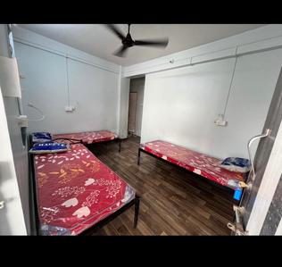 Bedroom Image of SK Boys PG in Shukrawar Peth, Pune