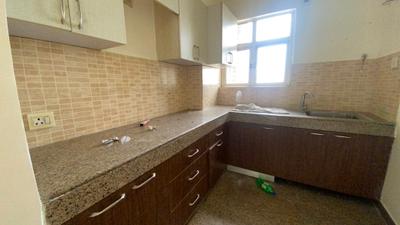 Kitchen Image of 1572 Sq.ft 3 BHK Apartment / Flat for sale in Raheja Sampada, Sector 92 Gurgaon for Rs. 12500000