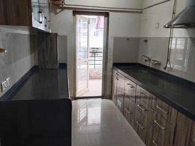 Kitchen Image of 1000 Sq.ft 2 BHK Apartment / Flat for sale in Tanya Apartment, Wakad Pune for Rs. 8500000