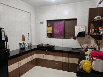 Kitchen Image of 1080 Sq.ft 2 BHK Apartment / Flat for rent in Kishor Bhagwati Palms, Thergaon Pune for Rs. 24000