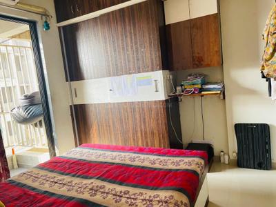 Bedroom Image of 1200 Sq.ft 2 BHK Apartment / Flat for rent in Devjit Pramukh Green Plus Bldg H, Chala Vapi for Rs. 24000