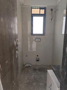 Common Bathroom Image of 575 Sq.ft 1 BHK Apartment / Flat for sale in Modibrick Gokulam, Dahisar West Mumbai for Rs. 9800000