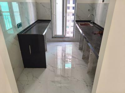 Kitchen Image of 690 Sq.ft 2 BHK Apartment / Flat for rent in Ruparel Skygreens I, Kandivali West Mumbai for Rs. 50000