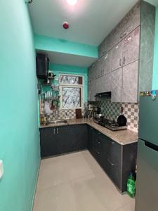 Kitchen Image of 850 Sq.ft 2 BHK Apartment / Flat for sale in Mahagun Mantra II, Noida Extension Greater Noida for Rs. 7500000