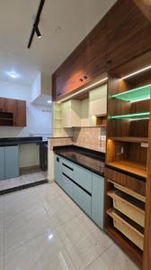 Kitchen Image of 748 Sq.ft 2 BHK Apartment / Flat for rent in Swarna Griha 4 Phase 1, Kakati Belagavi for Rs. 22000