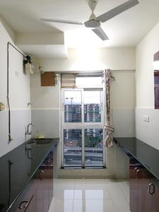 Kitchen Image of 900 Sq.ft 2 BHK Apartment / Flat for rent in Godrej Emerald, Kasarvadavali Thane for Rs. 27087
