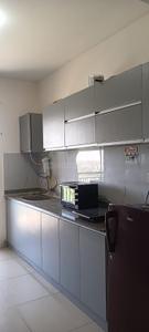 Kitchen Image of 1189 Sq.ft 2 BHK Apartment / Flat for rent in Plaza Tranquil Square, Kovilambakkam Chennai for Rs. 32000