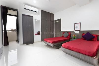 Bedroom Image of UNICORN INN PG 7359726067 in Ravapura, Mehsana