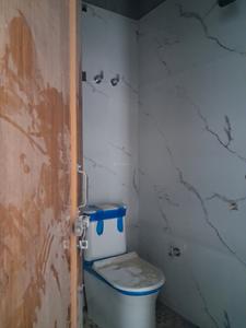 Common Bathroom Image of 799 Sq.ft 2 BHK Apartment / Flat for sale in MMD Harsh Residency, Phase 2 Noida for Rs. 4000000