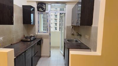 Kitchen Image of 1035 Sq.ft 2 BHK Apartment / Flat for sale in Amrapali Silicon City, Sector 76 Noida for Rs. 9800000