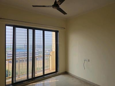 Living Room Image of 660 Sq.ft 1 BHK Apartment / Flat for rent in Kaul Heritage City, Vasai West Vasai for Rs. 17500