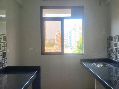 Kitchen Image of 770 Sq.ft 1 BHK Apartment / Flat for sale in Sai Om Sai Towers, Ambernath East Ambernath for Rs. 2599000