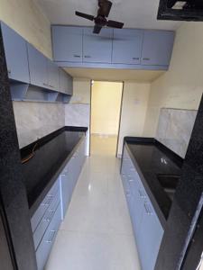 Kitchen Image of 689 Sq.ft 3 BHK Apartment / Flat for sale in Hubtown Greenwoods, Thane West Thane for Rs. 15500000