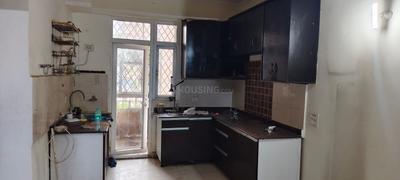 Kitchen Image of 940 Sq.ft 2 BHK Apartment / Flat for rent in Amrapali Zodiac, Sector 120 Noida for Rs. 23000