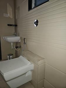 Common Bathroom Image of 1300 Sq.ft 2 BHK Apartment / Flat for sale in Karia Konark Orchid, Wagholi Pune for Rs. 8300000