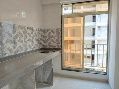 Kitchen Image of 668 Sq.ft 1 BHK Apartment / Flat for sale in Pushpak Nagar Navi Mumbai for Rs. 3950000