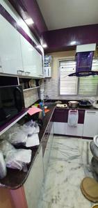Kitchen Image of 940 Sq.ft 2 BHK Apartment / Flat for sale in  Aich Villa, New Barrakpur Kolkata for Rs. 3900000