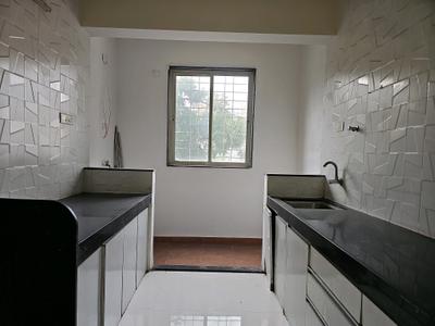 Kitchen Image of 950 Sq.ft 2 BHK Apartment / Flat for rent in Eklavya Skylark, Kharadi Pune for Rs. 27000