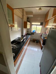 Kitchen Image of 950 Sq.ft 2 BHK Apartment / Flat for rent in Ajmera Royal Classic, Andheri West Mumbai for Rs. 85000