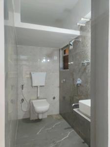 Common Bathroom Image of 1225 Sq.ft 3 BHK Apartment / Flat for sale in Vasai East Vasai for Rs. 9500000