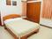 Bedroom Image of Mannat PG Home in Sector 142, Noida
