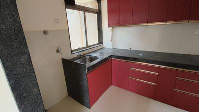 Kitchen Image of 990 Sq.ft 2 BHK Apartment / Flat for sale in Dhokali Naka Thane for Rs. 10800000