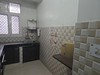 Kitchen Image of 1150 Sq.ft 2 BHK Apartment / Flat for rent in Purvanchal Bhagirathi Apartments, Sector 62 Noida for Rs. 38000
