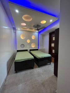 Bedroom Image of Singh pg in Janakpuri, New Delhi
