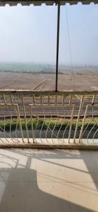 Balcony Image of 725 Sq.ft 1 BHK Apartment / Flat for sale in Yashwant Empire, Vasai East Vasai for Rs. 4100000