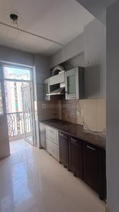 Kitchen Image of 955 Sq.ft 2 BHK Apartment / Flat for sale in Prateek Wisteria, Sector 77 Noida for Rs. 11200000