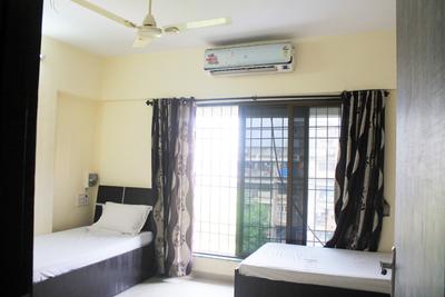 Bedroom Image of Sankalp Vigneshwar CHS LTD - Girls PG in Malad East, Mumbai