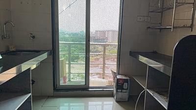 Kitchen Image of 690 Sq.ft 1 BHK Apartment / Flat for rent in Gajra Bhoomi Gardenia, Kalamboli Navi Mumbai for Rs. 16000