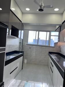 Kitchen Image of 950 Sq.ft 2 BHK Apartment / Flat for sale in Dynamic Grandeur, Undri Pune for Rs. 5600000