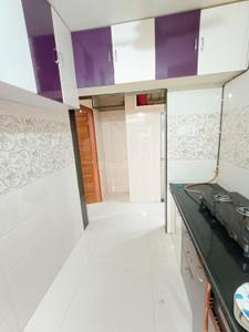 Kitchen Image of 680 Sq.ft 1 BHK Apartment / Flat for sale in Happy Home Sarvoday Symphony, Thakurli Thane for Rs. 4550000