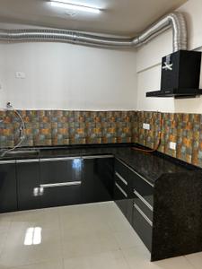 Kitchen Image of 1500 Sq.ft 3 BHK Apartment / Flat for sale in Abhinav Pebbles Urbania, Bavdhan Pune for Rs. 12800000